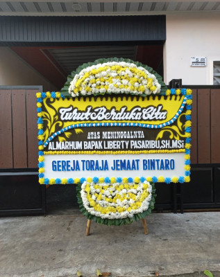 Papan Bunga Duka di Batu Tanjung